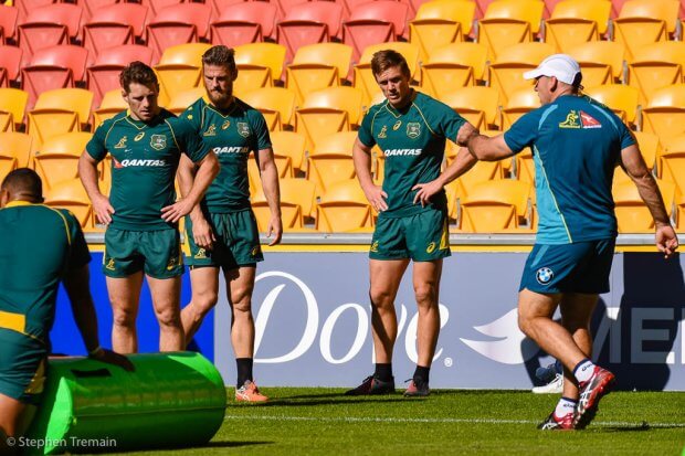 Nathan Grey gives some instructions to Bernard Foley, Rob Horne & Dane Haylett Petty