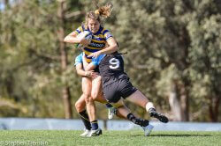 Grace Hamilton of University of Sydney is tackled